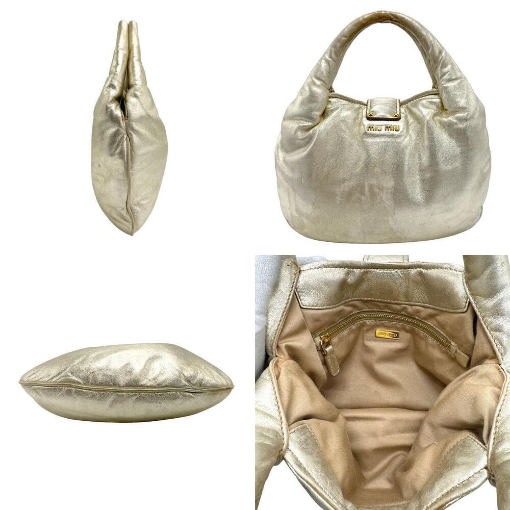 Miu Miu unique metallic bag leather fliplock gold hobo Gold